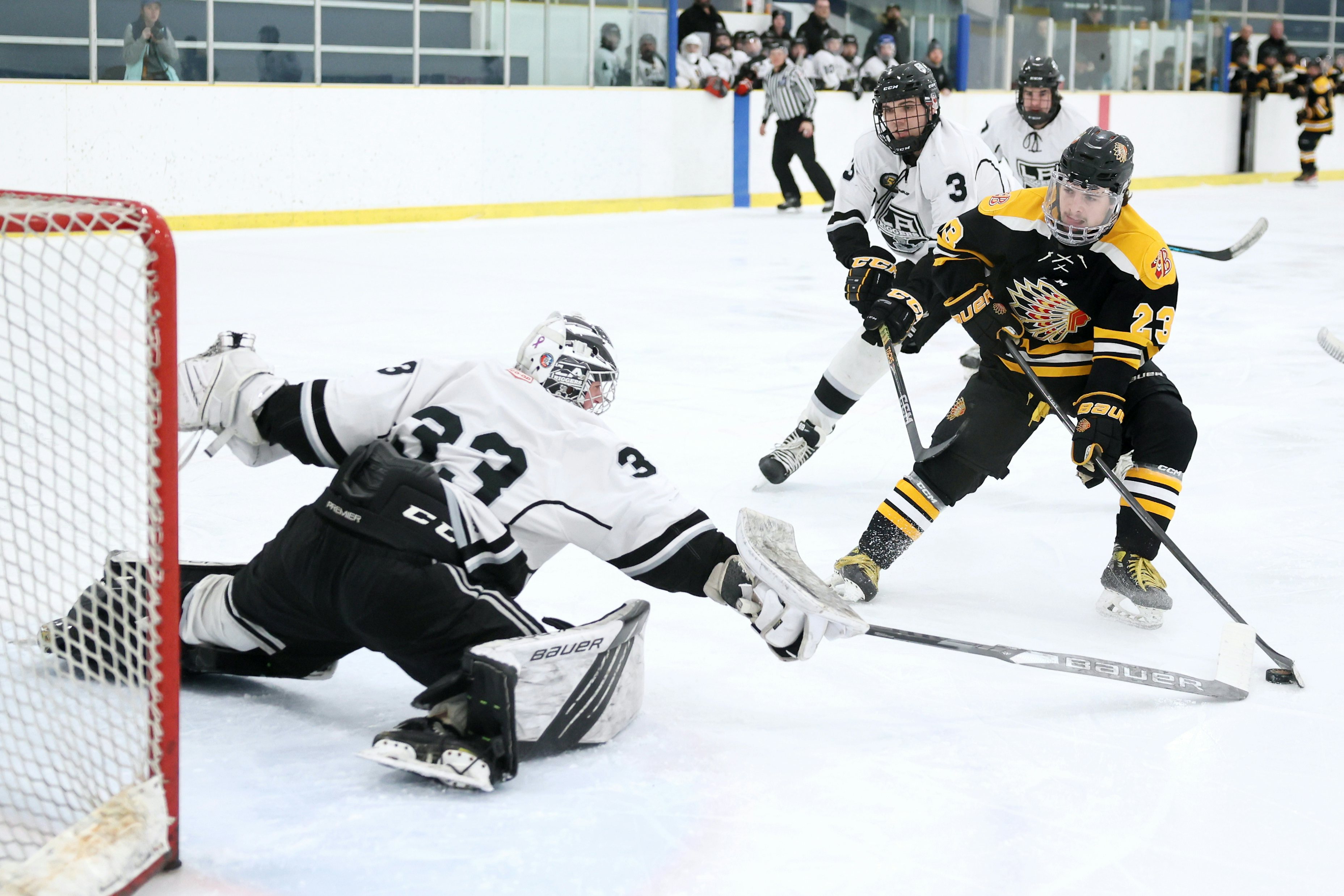 BEAUMONT, AB - January 23: Beaumont Chiefs forward Taylor Lafrance #23 scores on a breakaway against the Leduc Riggers during Capital Junior Hockey League play at the Ken Nichol Regional Recreational Centre in Beaumont, AB on January 23rd, 2024. (Photo by James Maclennan)