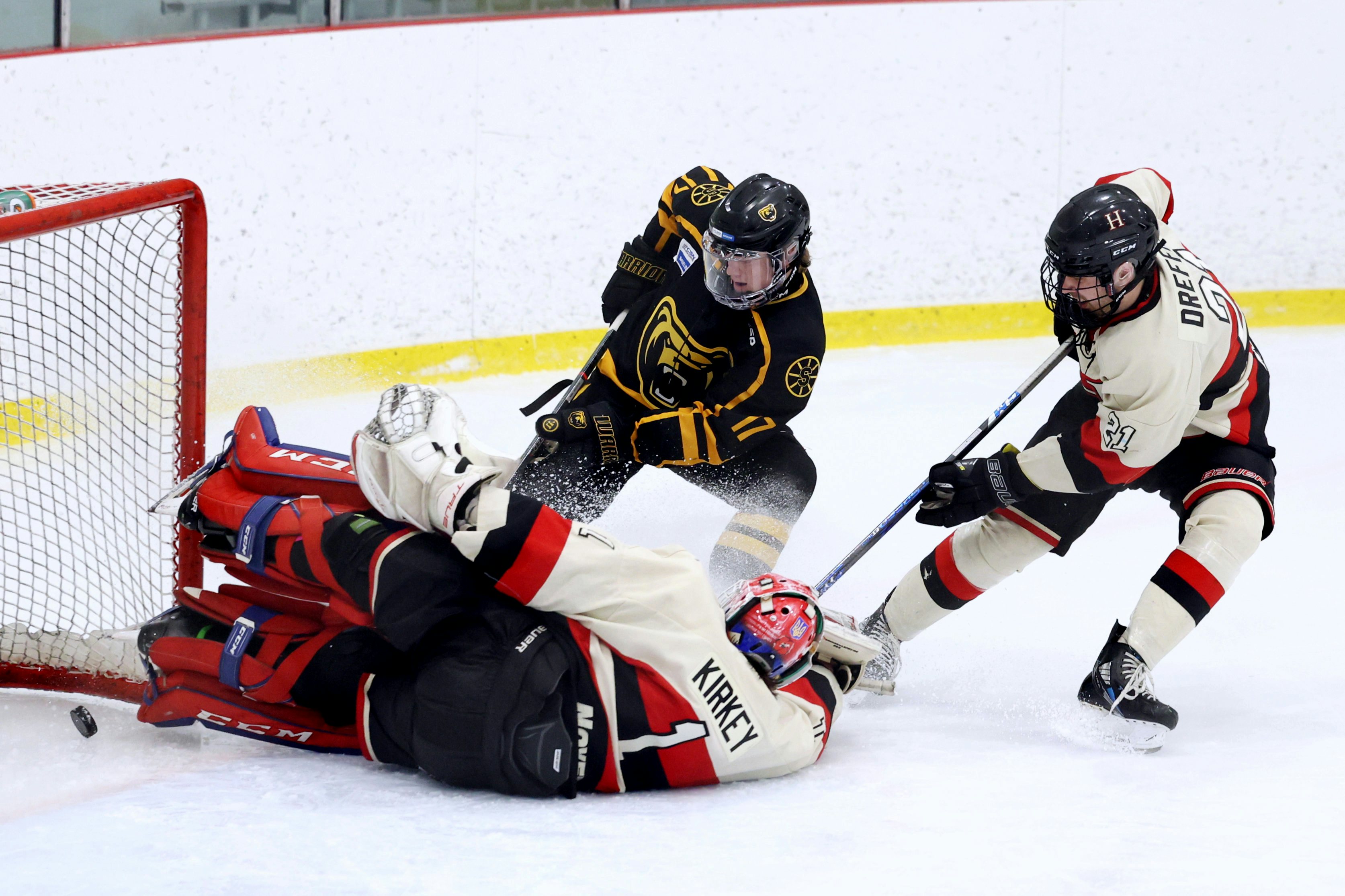 STRATHCONA COUNTY, AB - February 20: Strathcona Bruins forward Jake Ball #17 shoots the puck past Fort Saskatchewan Hawks goaltender Lachlan Kirkey #1 during Capital Junior Hockey League play at at the Strathcona Olympiette Centre in Stratchona County, AB on February 20th, 2024. (Photo by James Maclennan)