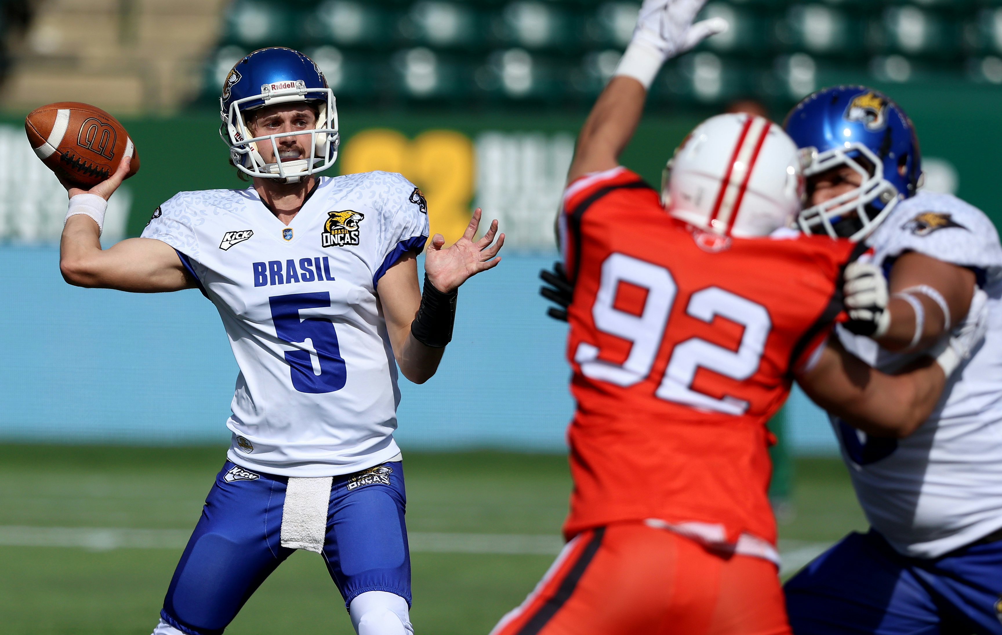 EDMONTON, AB - June 22: Team Brazil quarterback Gustavo Cornelius makes a pass during the IFAF U20 World Junior Football Championiships at Commonwealth Stadium in Edmonton, AB, Canada on June 22nd, 2024. (Photo by James Maclennan)