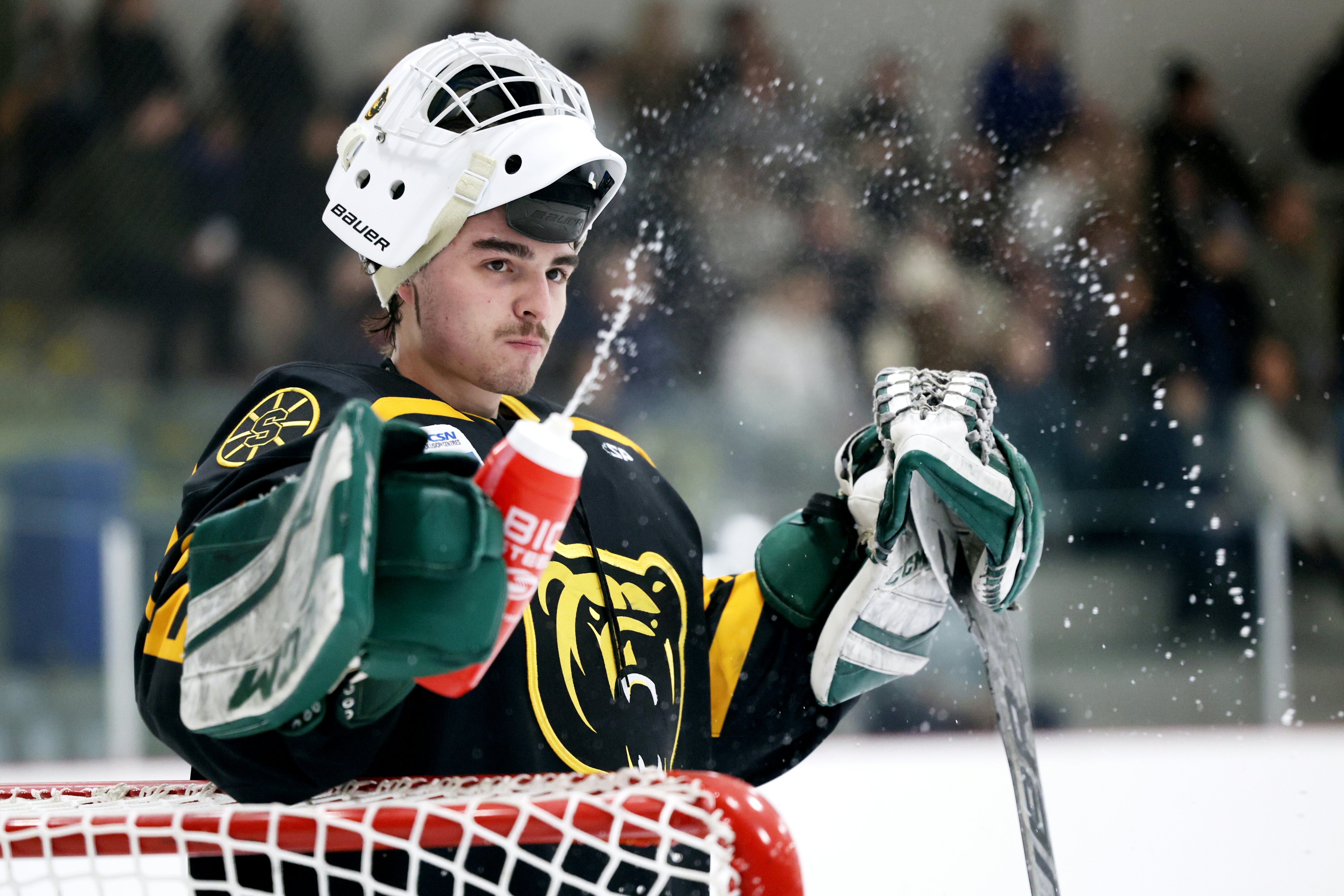 STRATHCONA COUNTY, AB - November 26: Strathcona Bruins goaltender Aidan Davies takes a water break during Capital Junior Hockey League play at the Strathcona Olympiette Centre in Stratchona County, AB on Nobember 26th, 2023. (Photo by James Maclennan)